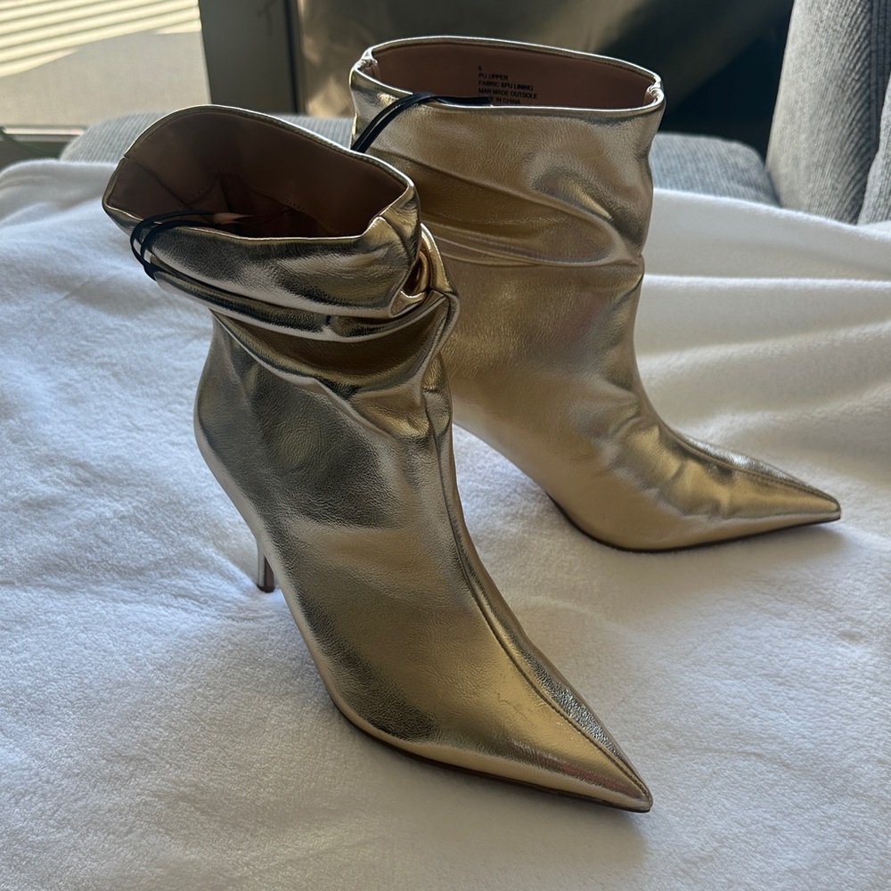 Express metallic gold ankle boots